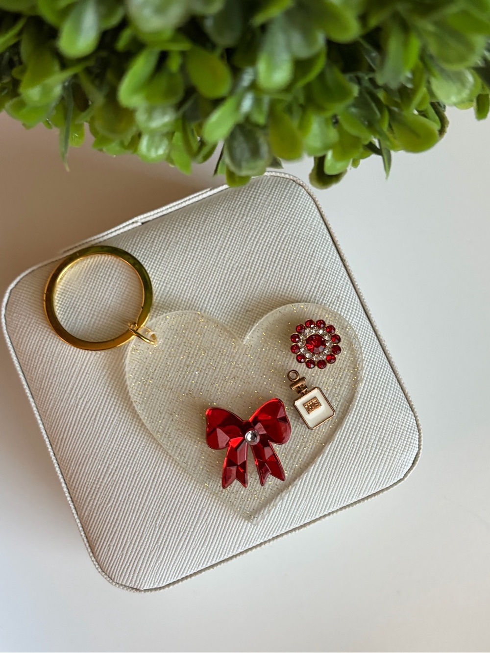 The Accessory Collective Gold Heart Keychain with Red Bow and Crystal Accents